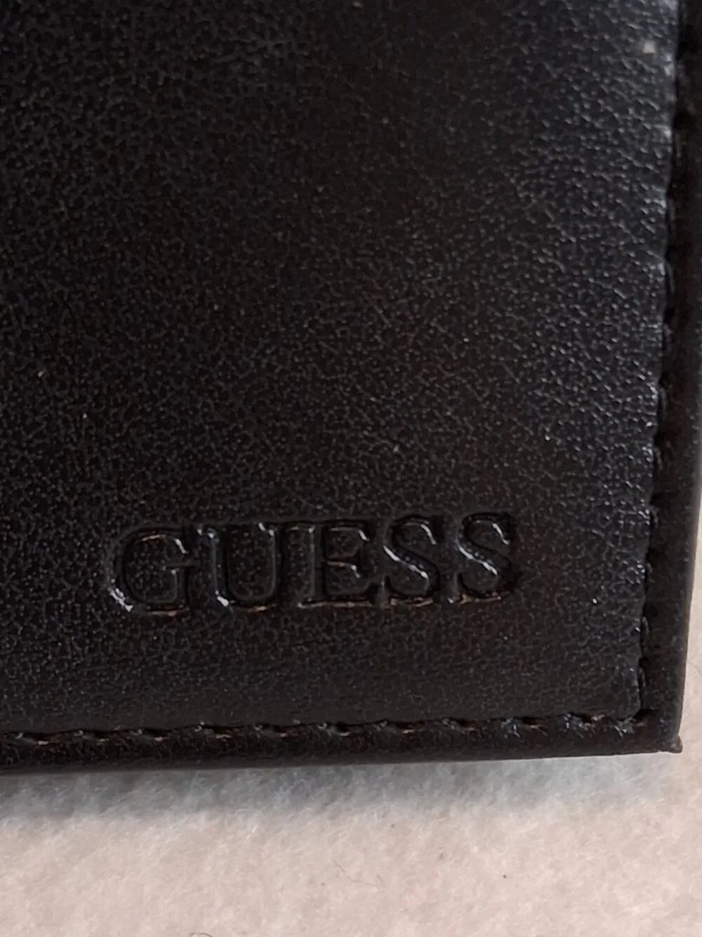GUESS Men’s Black Saffiano Passcase Bifold Wallet Red Stitching Accent